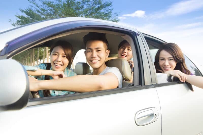 Young people having fun driving