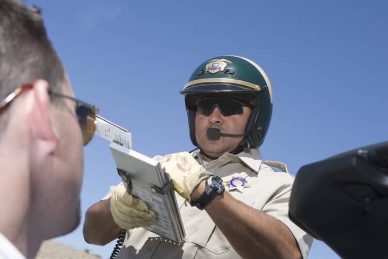 cop pulling over driver