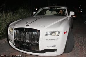 Kim Kardashian in her Rolls Royce - Courtesy of : http://www.dailymail.co.uk/tvshowbiz/article-2193721/Got-Kim-Kardashian-makes-car-lovers-jealous-tweets-pictures-150-000-Mercedes-G63.html